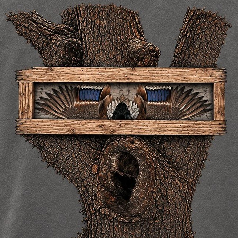 Close-up of the back print: a framed open-wing duck set into an oak trunk